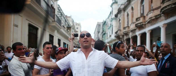 Actor Vin Diesel poses before a fashion show by German designer Karl Lagerfeld as part of his latest inter-seasonal Cruise collection for fashion house Chanel at the Paseo del Prado street in Havana, Cuba