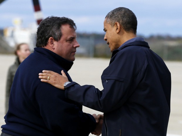 President Obama talks to New Jersey Governor Christie after arriving at airport in New Jersey