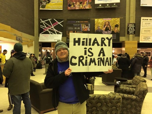 Anti-Hillary sign outside the DNC Debate in Milwaukee on Feb. 11, 2016 (Philip DeVoe)