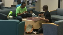 College students play a board game at George Washington University. (DCNF photo)
