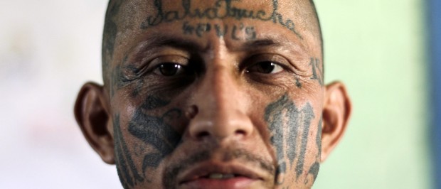 Carlos Tiberio Ramirez, one of the leaders of the Mara Salvatrucha (MS-13) gang poses while attending the Day of the Virgin of Mercy celebrations at the female prison in San Salvador