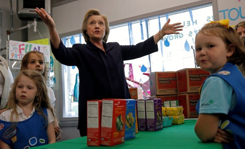 U.S. Democratic presidential candidate Hillary Clinton buys Girl Scouts' cookies during a campaign event in Ashland, Kentucky, United States, May 2, 2016. REUTERS/Jim Young