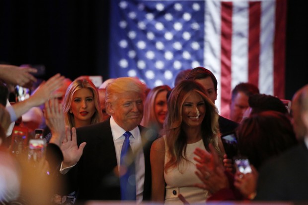 Republican U.S. presidential candidate Donald Trump arrives with his wife Melania (R) at his campaign victory party to speak to supporters after his rival [crscore]Ted Cruz[/crscore] dropped out of the race following the results of the Indiana state primary, at Trump Tower in Manhattan, New York, U.S., May 3, 2016. REUTERS/Lucas Jackson - RTX2CPIA