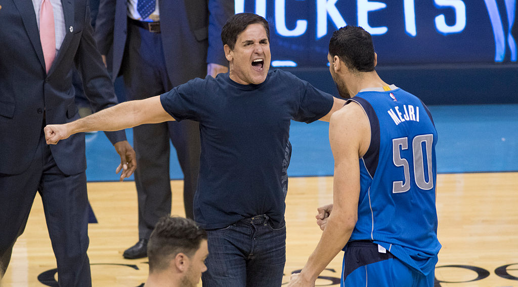 Mark Cuban owner of the Dallas Mavericks celebrates with Salah Mejri after Game Two of the Western Conference Quarterfinals (Getty Images)