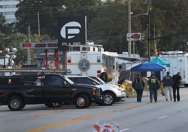 ORLANDO, FL - JUNE 15: Law enforcement officials continue to investigate the Pulse gay nightclub where Omar Mateen killed 49 people on June 15, 2016 in Orlando, Florida. The mass shooting killed 49 people and injuring 53 others in what is the deadliest mass shooting in the country's history. (Photo by Joe Raedle/Getty Images)