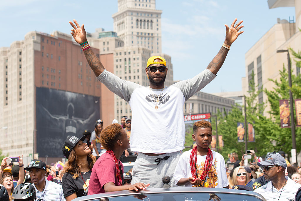LeBron celebrates the Cavs first NBA championship at the victory parade (Photo by Jason Miller/Getty Images)
