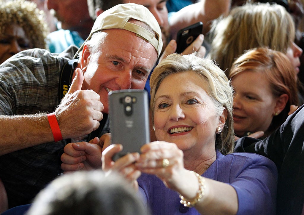 Hillary Clinton take selfies with campaign supporters after her speech at a campaign rally at the Cincinnati Museum Center (Getty Images)