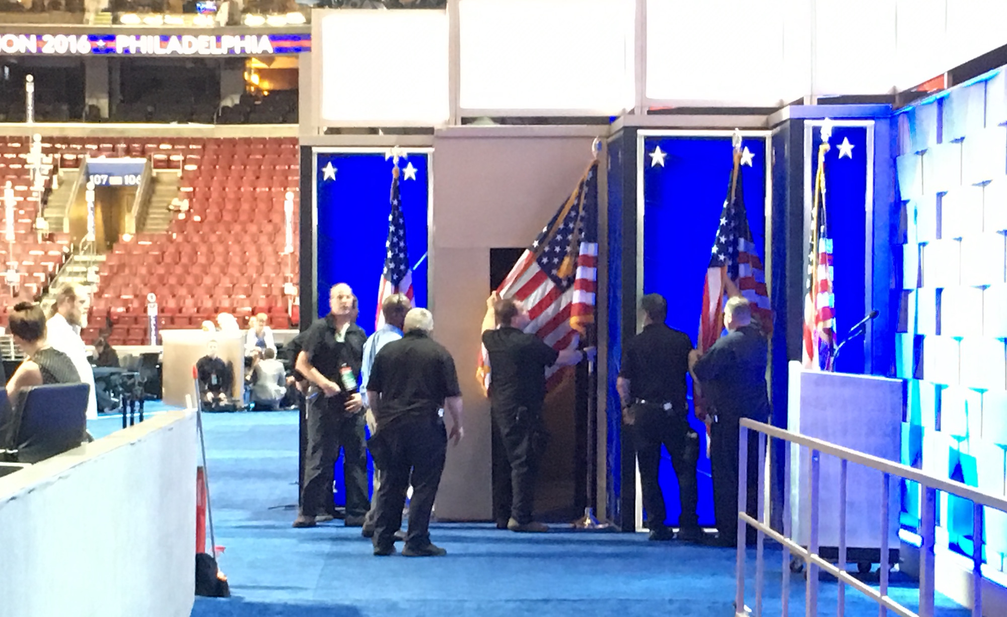 American flags are added to the DNC stage (Vince Coglianese/The Daily Caller)