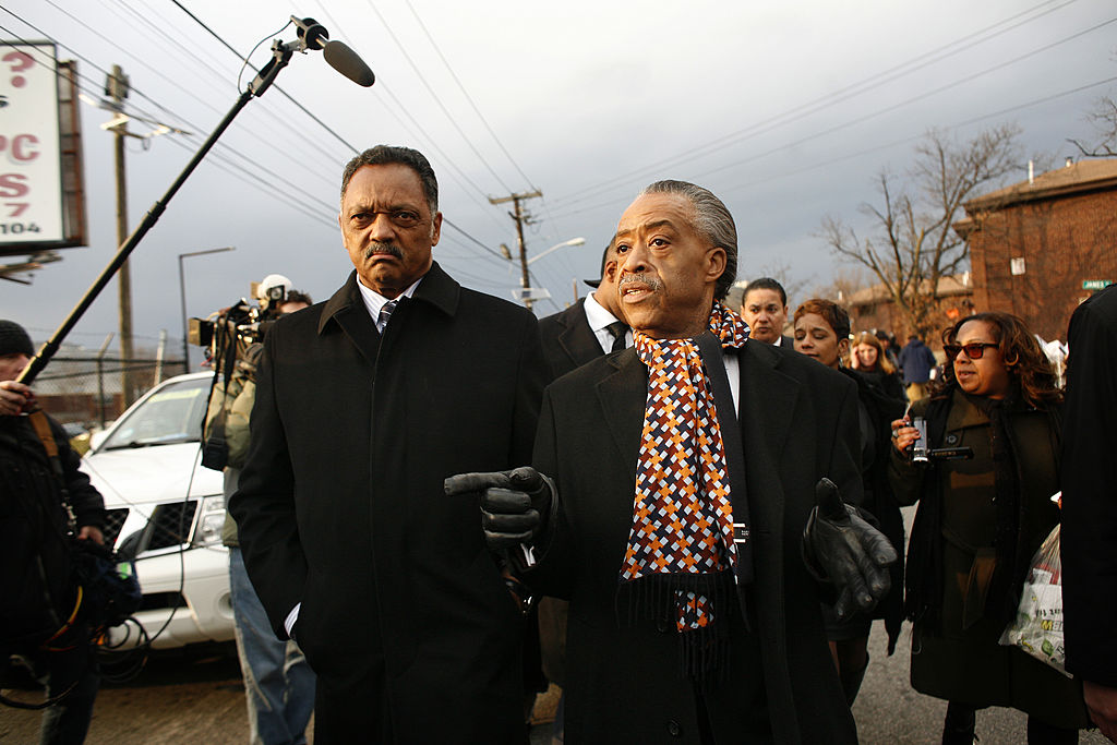 Jesse Jackson Al Sharpton leave Whitney Houston's funeral at New Hope Baptist Church (Getty Images) 