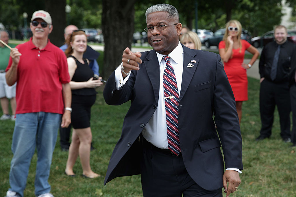 Former Rep. Allen West (R-FL) spots a friend in the crowd before a news conference organized by Special Operations Speaks Out (SOS) Political Action Committee (Getty Images)