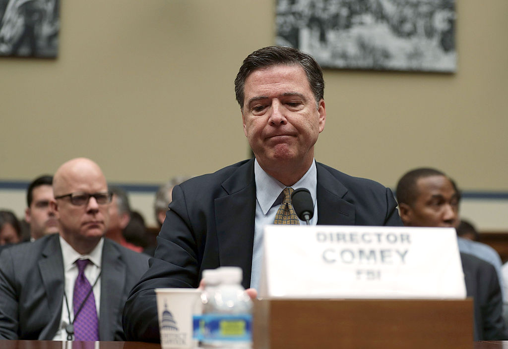 FBI Director James Comey testifies during a hearing before the House Committee on Oversight and Government Reform (Getty Images)