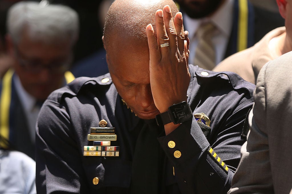 Dallas Police Chief David Brown pauses at a prayer vigil following the deaths of five police officers during a Black Live Matter march on July 8, 2016 (Getty Images)