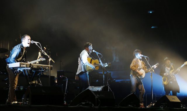 Mumford & Sons, (from L) Ben Lovett , Marcus Mumford, Winston Marshall and Ted Dwane perform on the Pyramid Stage at the Glastonbury music festival at Worthy Farm in Somerset, June 30, 2013. (photo: REUTERS/Olivia Harris)