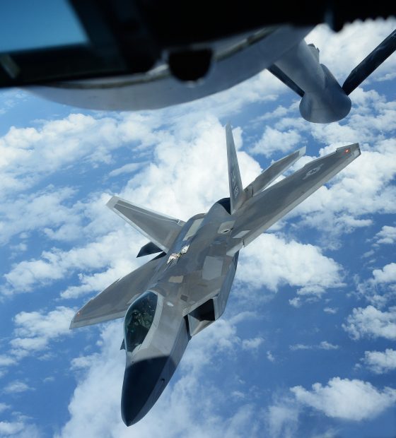 An F-22 Raptor from the 199th Fighter Squadron positions itself to receive fuel from a KC-135 Stratotanker from the 96th Air Refueling Squadron Jan. 10, 2014, near Joint Base Pearl Harbor-Hickam, Hawaii. Both aircraft and their crews participated in the Inaugural Total Force Integration Warrior Day, a training event that tested the cooperation and capabilities of multiple base agencies. The training highlighted the importance of integrating operations of active-duty, Hawaii National Guard and Air Force Reserve units. (U.S. Air Force photo/Staff Sgt. Alexander Martinez)