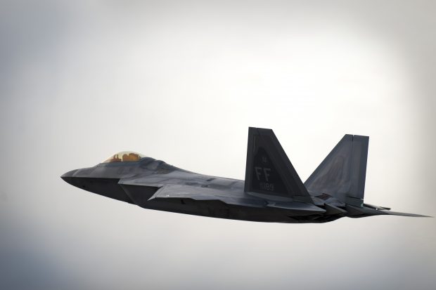 An F-22 Raptor from the 27th Fighter Squadron, Joint Base Langley-Eustis, Va., takes off to begin a training mission during Red Flag 14-1 at Nellis AFB, Nev. The 27th FS is one of many U.S. and coalition units deployed to Nellis AFB to participate in three weeks of simulated air-combat training over the 2.9 million acre Nevada Test and Training Range. (U.S. Air Force photo by Airman 1st Class Joshua Kleinholz)