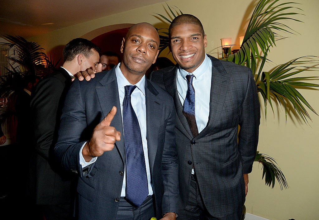 Dave Chappelle and Michael Sam attend the 2014 GQ Men Of The Year party (Getty Images)