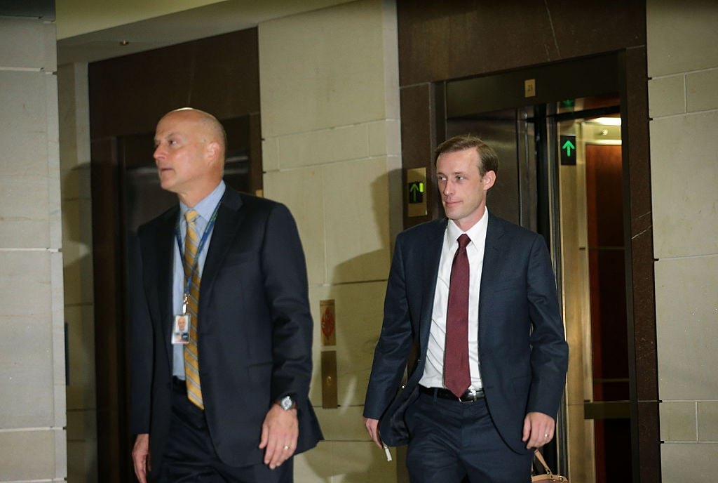 Jake Sullivan (R), Hillary Clinton's top foreign policy campaign adviser and her deputy chief of staff at the State Department, arrives for a closed-door deposition before the House Select Committee on Benghazi (Getty Images)