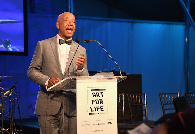 BRIDGEHAMPTON, NY - JULY 16: CEO of Rush Communications Russell Simmons speaks onstage during Rush Philanthropic Arts Foundation's 2016 ART FOR LIFE Benefit at Fairview Farms on July 16, 2016 in Bridgehampton, New York. (Photo by Nicholas Hunt/Getty Images for Rush Philanthropic Arts Foundation)