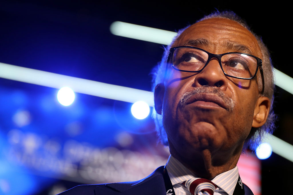 Reverend Al Sharpton stands on stage prior to the start of the first day of the Democratic National Convention (Getty Images)