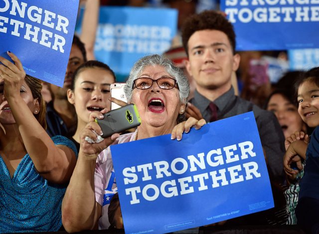 LAS VEGAS, NV - AUGUST 04: Supporters cheer for Democratic presidential nominee and former Secretary of State Hillary Clinton as she speaks at the International Brotherhood of Electrical Workers Union Hall on August 4, 2016 in Las Vegas, Nevada. According to recent polls, Clinton leads her opponent Republican Donald Trump in several swing states including New Hampshire and Florida. (Photo by David Becker/Getty Images)