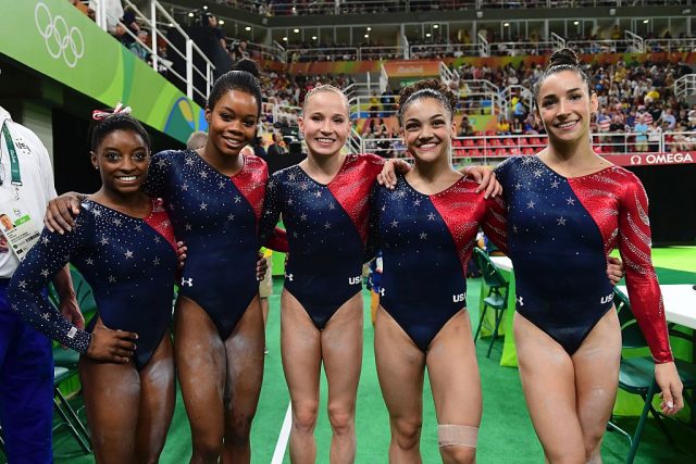 (L-R) US gymnast Simone Biles, US gymnast Gabrielle Douglas, US gymnast Madison Kocian, US gymnast Lauren Hernandez and US gymnast Alexandra Raisman. (Photo: Getty Images)