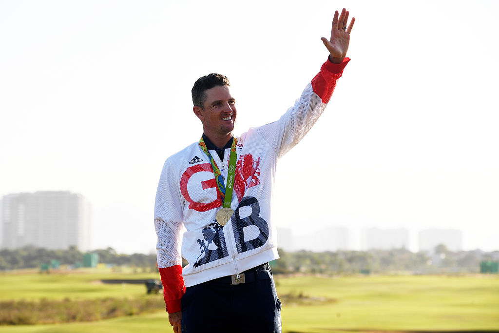 Gold Medal winner Justin Rose standing atop the podium in Rio. (Photo by Ross Kinnaird/Getty Images)