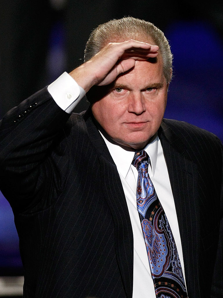 Rush Limbaugh salutes as he is introduced as a judge before a preliminary competition for the 2010 Miss America Pageant (Getty Images)