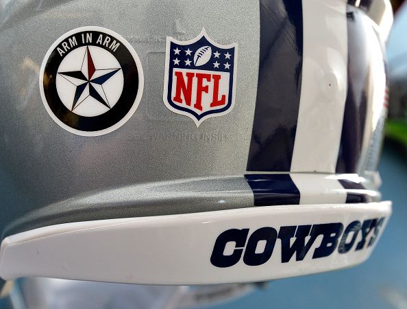A sticker in support of the Dallas Police department on the Dallas Cowboys' helmets during training camp in Oxnard, Calif., on Saturday, July 30, 2016. (Max Faulkner/Fort Worth Star-Telegram/TNS via Getty Images)