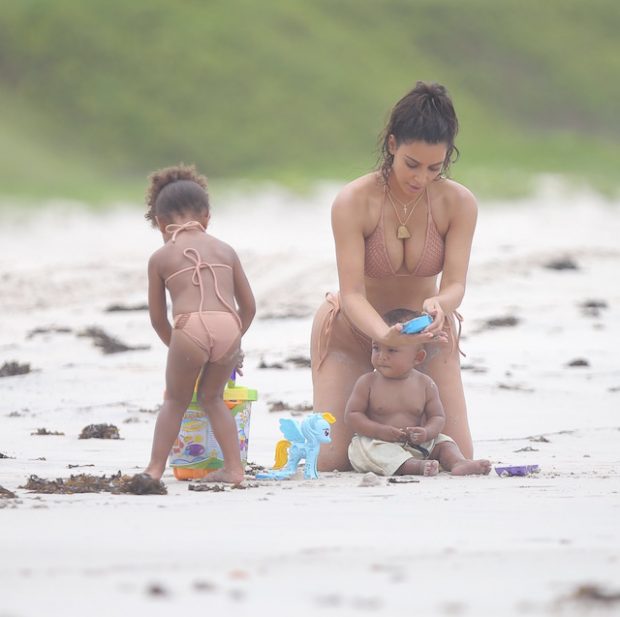 Kim Kardashian enjoyed her summer vacation with baby Saint and North West as they all play in the sand together at Casa Aramara in Punta Mita Mexico North was joined by her baby brother for his first tropical trip in the water together as a family. Kim was having fun on the ground with the baby as she and her daughter spent some quality time together all in their summer swimwear. Mandetory mention of "Casa Aramara in Punta Mita Mexico" <P> <B>Ref: SPL1336080 180816 </B><BR /> Picture by: Splash News<BR /> </P><P> <B>Splash News and Pictures</B><BR /> Los Angeles:310-821-2666<BR /> New York: 212-619-2666<BR /> London: 870-934-2666<BR /> photodesk@splashnews.com<BR /> </P>