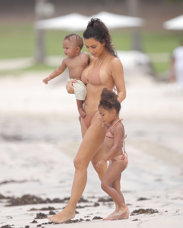 Kim Kardashian enjoyed her summer vacation with baby Saint and North West as they all play in the sand together at Casa Aramara in Punta Mita Mexico North was joined by her baby brother for his first tropical trip in the water together as a family. Kim was having fun on the ground with the baby as she and her daughter spent some quality time together all in their summer swimwear. Mandatory mention of "Casa Aramara in Punta Mita Mexico" Ref: SPL1336080 180816 Picture by: Splash News Splash News and Pictures Los Angeles: 310-821-2666 New York: 212-619-2666 London: 870-934-2666 photodesk@splashnews.com
