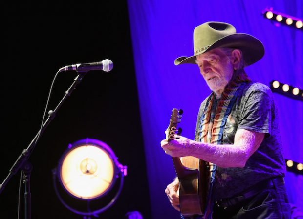 NASHVILLE, TN - MARCH 16: Willie Nelson performs at The Life & Songs of Kris Kristofferson produced by Blackbird Presents at Bridgestone Arena on March 16, 2016 in Nashville, Tennessee. (Photo by Rick Diamond/Getty Images for Essential Broadcast Media)