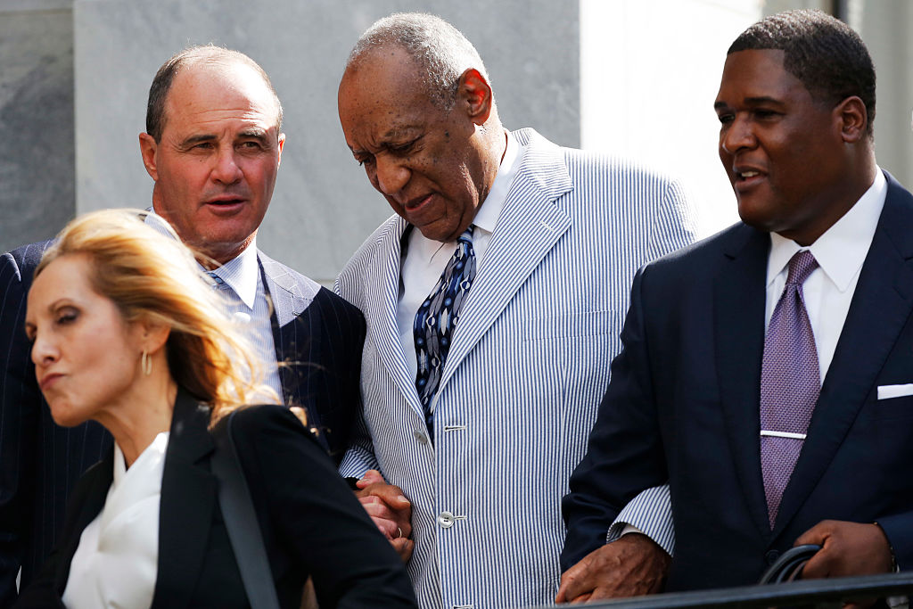 Comedian Bill Cosby leaves the Montgomery County Courthouse with his criminal defense lawyer Brian McMonagle(L) after a pretrial conference related to aggravated indecent assault charges on September 6, 2016, in Norristown, Pennsylvania. Disgraced US megastar Bill Cosby will go on trial June 5, 2017 accused of sexually assaulting a woman at his Philadelphia home more than a decade ago, a judge said Tuesday. The pioneering black comedian, who faces up to 10 years in prison if convicted, had returned to court in Pennsylvania as part of multiple attempts to avoid standing trial for the alleged 2004 assault. Cosby allegedly plied Andrea Constand with pills and wine, then sat her down on a couch, where the actor allegedly assaulted her. / AFP / DOMINICK REUTER (Photo credit should read DOMINICK REUTER/AFP/Getty Images)