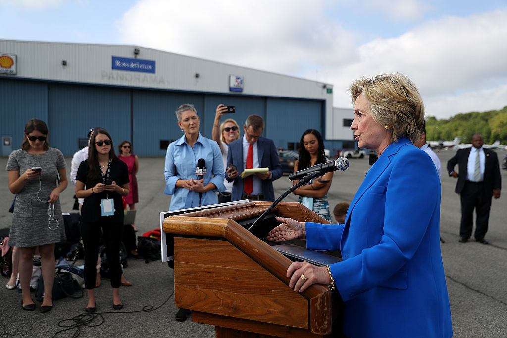Hillary Clinton speaks to reporters on the tarmac at Westchester County Airport on September 8, 2016 (Getty Images)