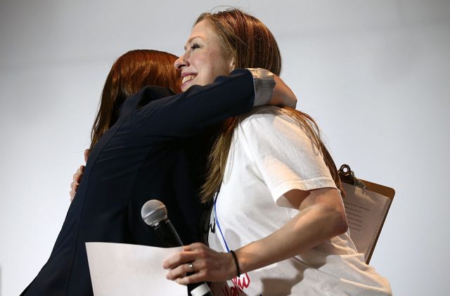 SALEM, WV - SEPTEMBER 14: Chelsea Clinton (R), daughter of Democratic presidential nominee Hillary Clinton, is hugged by a student while campaigning for her mother at Roanoke College September 14, 2016 in Salem, Virginia. Clinton delivered remarks and took questions from students and members of the community, primarily on topics related to college affordability. (Photo by Win McNamee/Getty Images)
