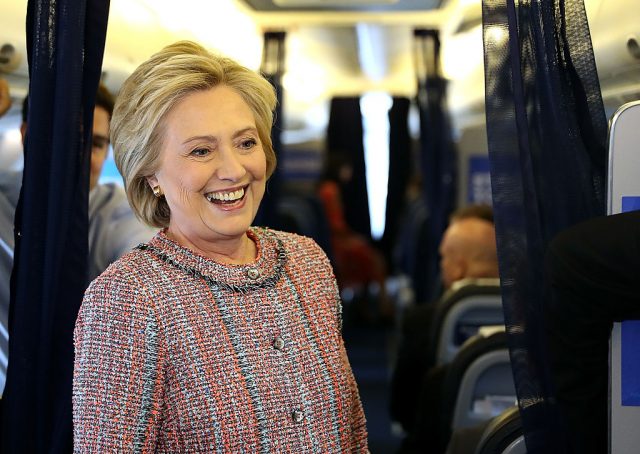 Hillary Clinton speaks to members of the traveling press aboard her campaign plane at Westchester County Airport on September 15, 2016 (Getty Images)