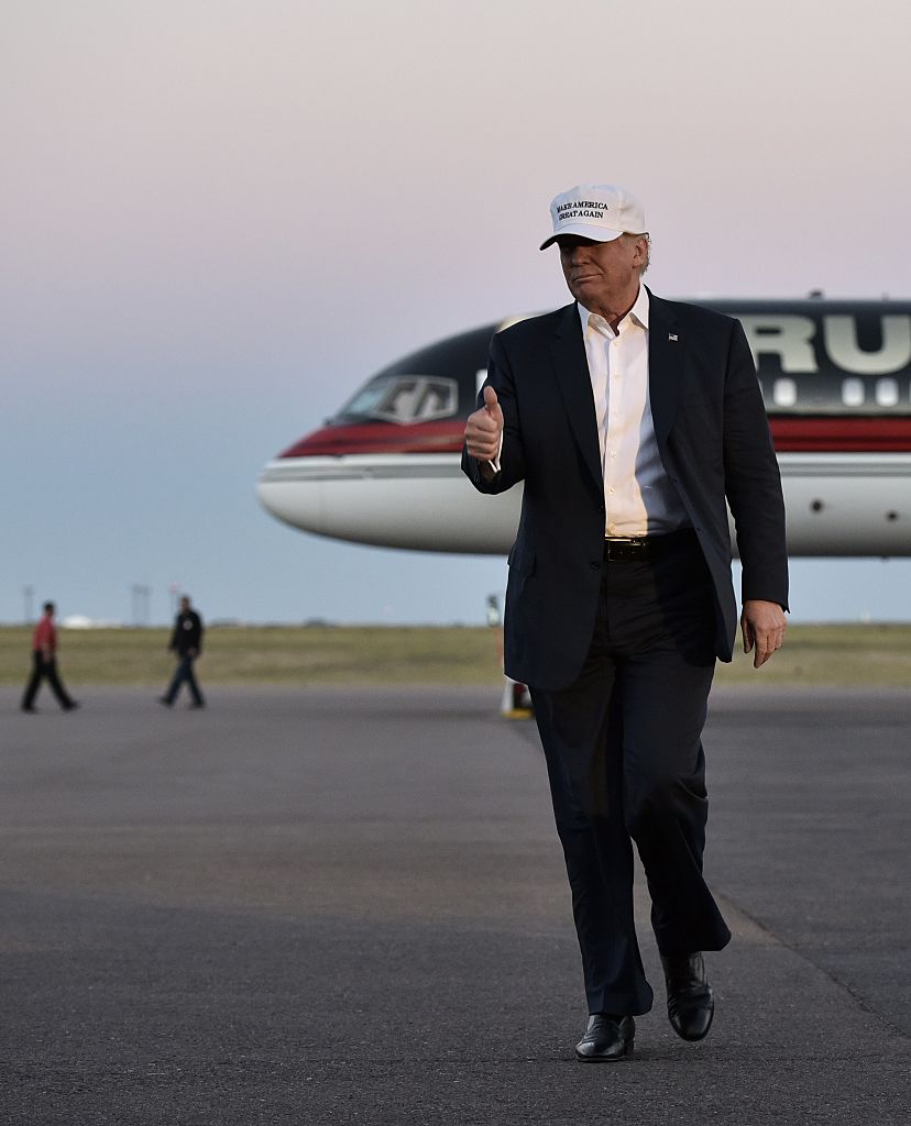 Donald Trump walks across the tarmac as he arrives for a rally at the JetCenters of Colorado in Colorado Springs on September 17, 2016.(Getty Images)