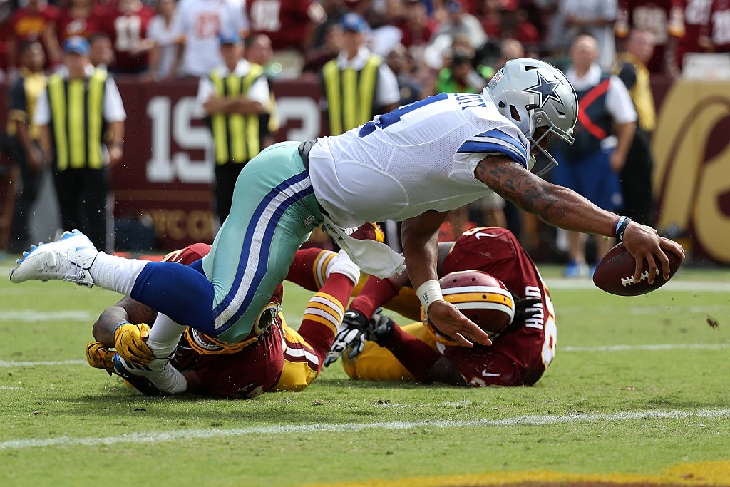 Prescott led the Cowboys to a win Sunday over the Redskins (Photo by Rob Carr/Getty Images)
