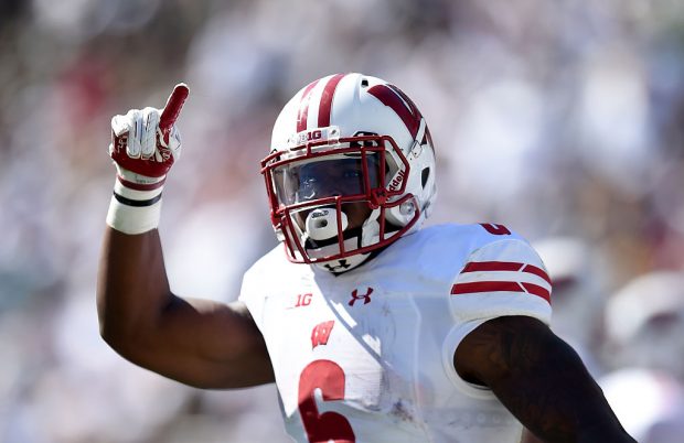 EAST LANSING, MI - SEPTEMBER 24: Corey Clement #6 of the Wisconsin Badgers holds up a finger to the crowd after running for a touchdown during the game against the Michigan State Spartans at Spartan Stadium on September 24, 2016 in East Lansing, Michigan. (Photo by Bobby Ellis/Getty Images)