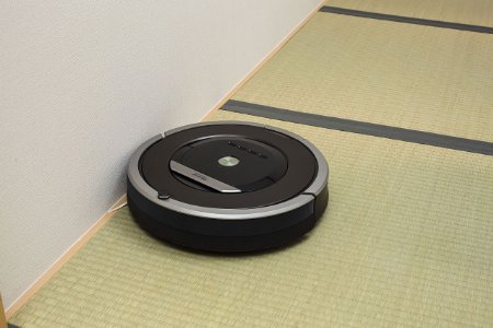 The Roomba is able to vacuum around walls without bumping into them (Photo via Amazon)