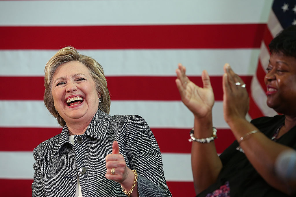 Hillary Clinton laughs during the Hartford Gun Violence Prevention Discussion on April 21, 2016 in Hartford, Connecticut (Getty Images)