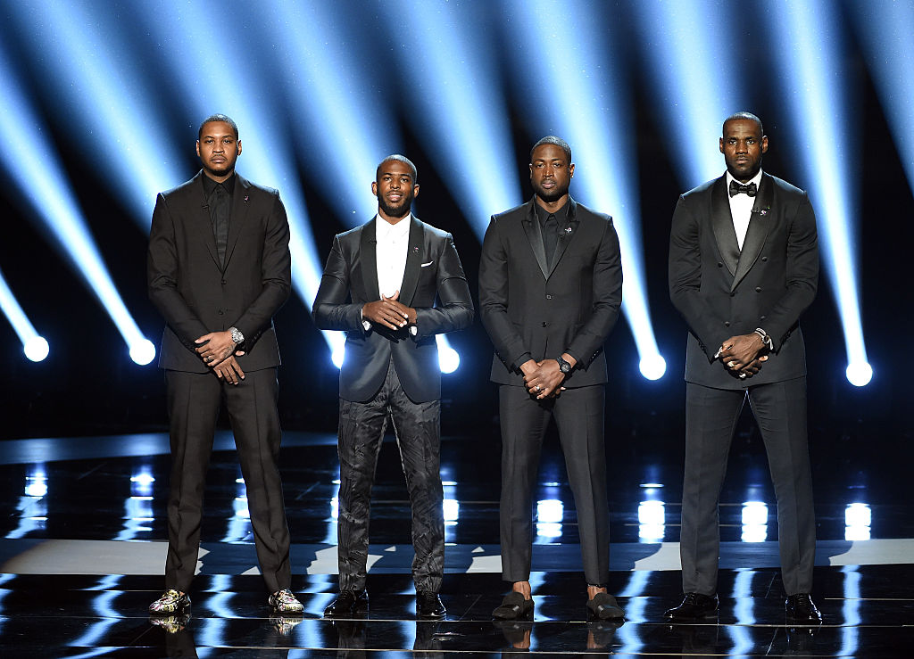 NBA players Carmelo Anthony, Chris Paul, Dwyane Wade and LeBron James speak onstage during the 2016 ESPYS. (Photo by Kevin Winter/Getty Images)