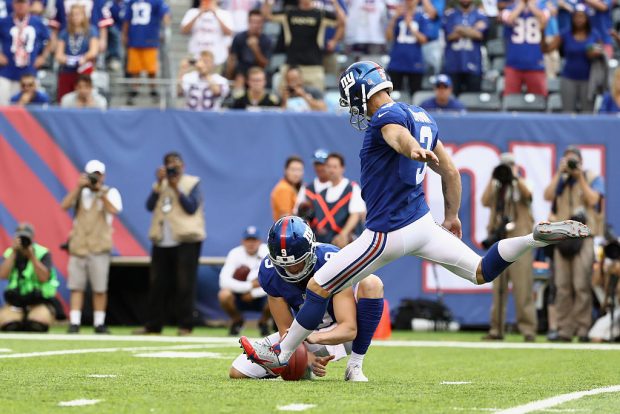 Kicker Josh Brown #3 of the New York Giants kicks the game-winning field goal against the New Orleans Saints. (Photo by Elsa/Getty Images)
