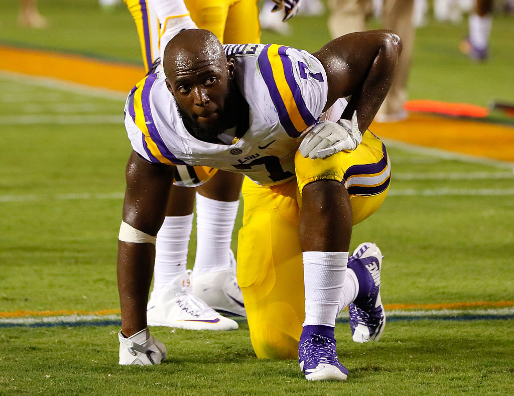 Leonard Fournette takes a knee on the field. (Photo by Kevin C. Cox/Getty Images)