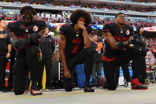 Colin Kaepernick continues his national anthem protest. (Photo by Thearon W. Henderson/Getty Images)