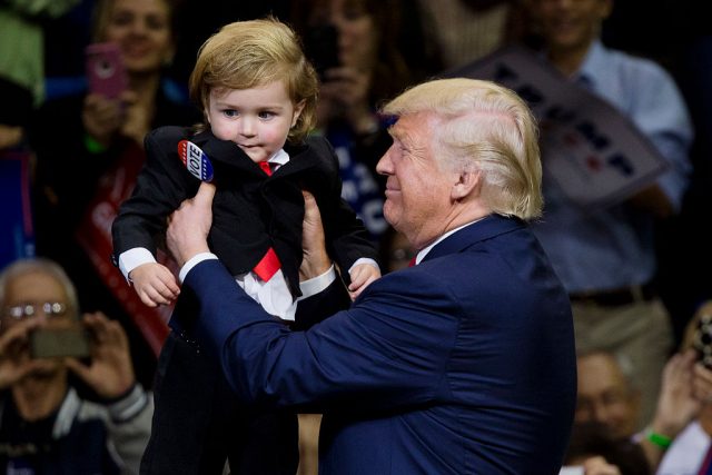 During the rally, Trump invited a child who was dressed like him on stage. (Photo: Getty Images)