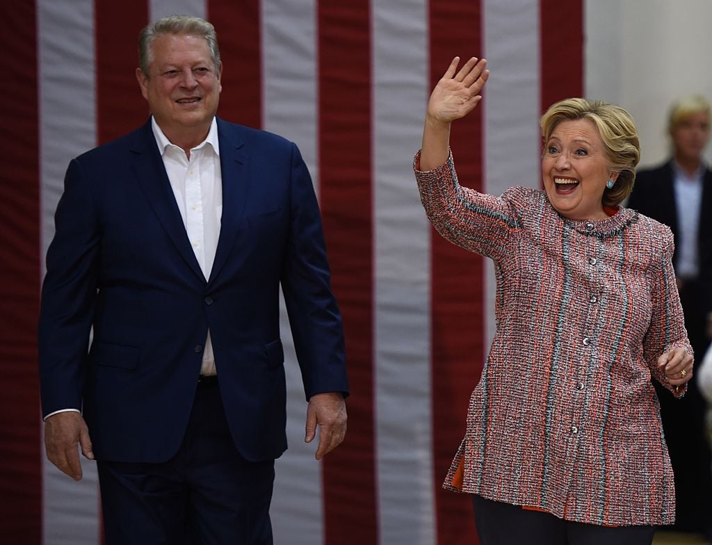 Hillary Clinton and Former Vice President Al Gore arrive for a climate change event at Miami Dade College-Kendall Campus in Miami, Florida (Getty Images)