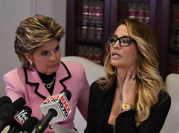 jessica drake (R), speaks beside attorney Gloria Allred (L) about allegations of sexual misconduct against Republican presidential hopeful Donald Trump during a press conference on October 22, 2016. (Photo credit: Mark Ralston/AFP/Getty Images)