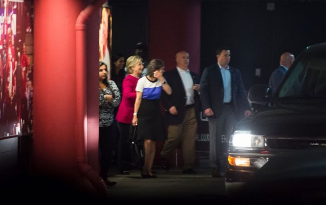 Clinton leaving the concert. (Photo: ROBYN BECK/AFP/Getty Images)
