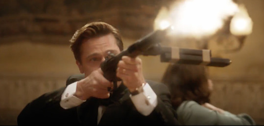 Brad Pitt and Marion Cottilard gunning down Nazis (Photo credit: Screenshot/YouTube Paramount Pictures)