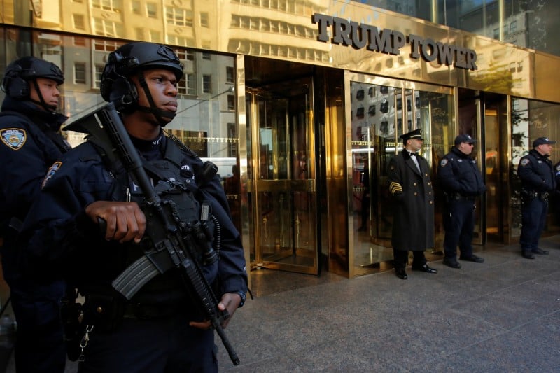 Members of the New York Police Department's Counterterrorism Bureau stand watch outside U.S. Republican presidential nominee Donald Trump's Trump Tower ahead of the U.S. presidential election in Manhattan, New York, U.S., November 7, 2016. REUTERS/Andrew Kelly 